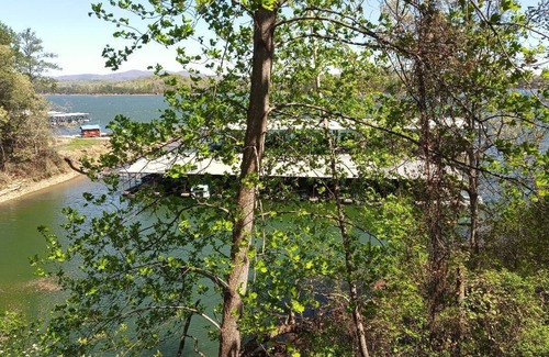 Tate Cabina | Carters Lakeside Log Cabin #1. Located in Carters Lake Marina, with boat slip !