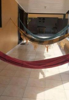 Balneario Arroio do Silva Casa | Casa Amarela próximo ao mar com mesa de Sinuca, 100 mts - 2 km do centro