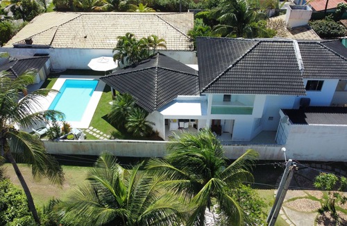 Parafuso Casa | Casa Canto do Mar Guarajuba, between the beach and the lagoon