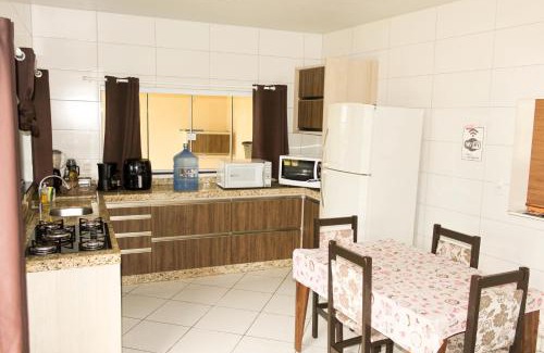 Vila Nova Casa | Casa com ar condicionado a 350 mt da Praia da Vila, Imbituba internacional ar cond