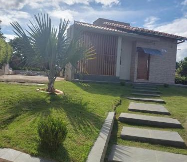 Capitolio Casa | Casa com piscina vista para lago, 03 quartos confortáveis