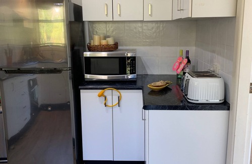 Newport Apartamento | Casa de Piña, 700 mts to Newport Beach, headland views, spacious 2 bedrm apt.