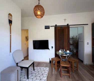 Pontal da Cruz Apartamento | Casa de praia com ar condicionado.