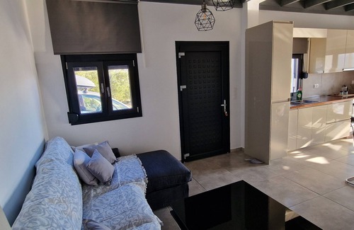 Goudhouros Villa | Casa di Olive, a cottage with fireplace and sea view