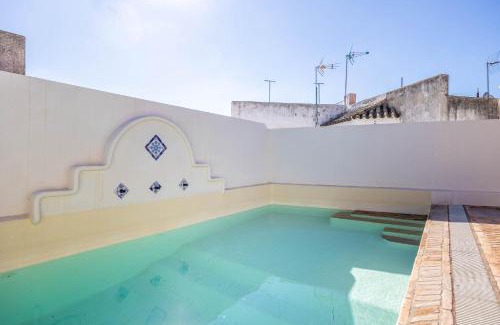 San Bartolome Casa | CASA PALACIO SXVIII CON PISCINA en centro histórico de SEVILLA