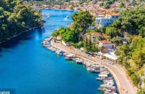 Longos Apartamento | Apartamento de 2 dormitorios y 2 baños, aire acondicionado y wifi gratuitos, céntrico, vistas al mar, a poca distancia de la playa.