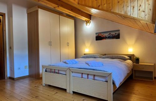Terzolas Apartamento | Charm & Relax - Accogliente Mansarda Alpina