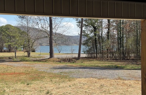 Guntersville Cabina | Charming 2-bed 2-bath cabin with views of Lake Guntersville from every room.