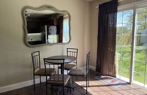 Hitchcock Casa | Charming 2-bedroom pet-friendly house with fenced yard minutes from Galveston!