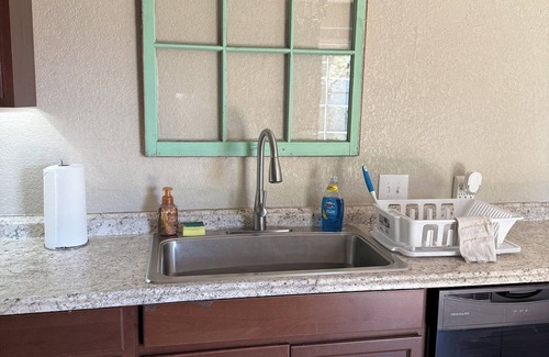 Hitchcock Casa | Charming 2-bedroom pet-friendly house with fenced yard minutes from Galveston!