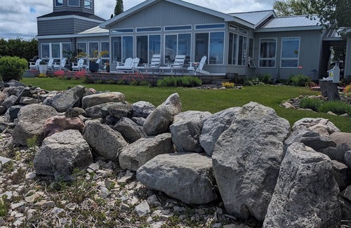 Chippewa County Cabaña | Charming cottage with amazing views St Mary's River in De TourVillage