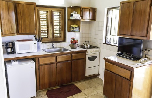 Newcastle Cabaña | CONCH SHELL COTTAGE en la playa de arena blanca, RECOGIDA GRATUITA EN EL AEROPUERTO sin cargo
