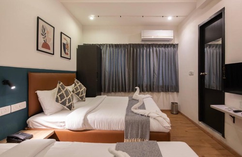 Thousand Lights Hotel | Convastay Prestige- Near Apollo Hospital & US Consulate