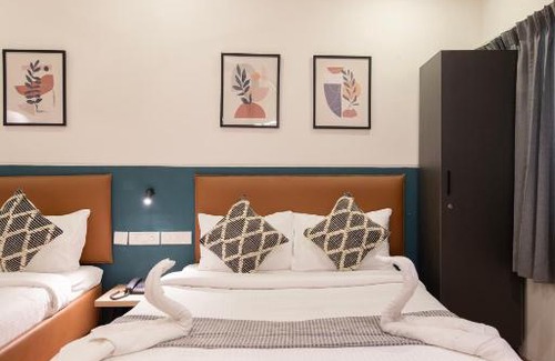 Thousand Lights Hotel | Convastay Prestige- Near Apollo Hospital & US Consulate