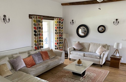 Dompierre-les-Eglises Casa | Converted barn in rolling countryside with pool and spa.