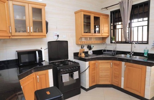 Bukoto Condominio | Cozy 3BR, Fast WiFi, Near Metroplex Mall, Parking