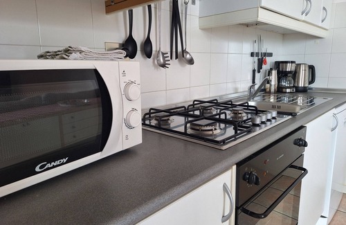 Sala Comacina Apartamento | Cozy apartment with swimming pool, just a short walk from the lakeside.