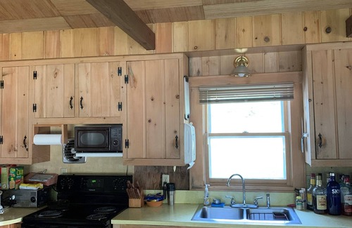 New London Cabaña | Cozy beautiful cottage on the Wolf River located 5 miles New London