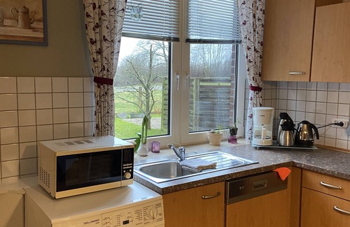 Schoenwalde am Bungsberg Apartamento | Cozy farmhouse situated on hill, with beautiful view of nature