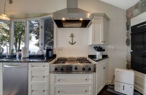 Mullett Lake Cabaña | Cozy Mullett Lake Paradise- Lakefront property with Year-Round Recreation!!!