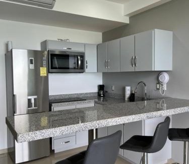 Zona Dorada Apartamento | Departamento en Tramonto Resort con vista al mar