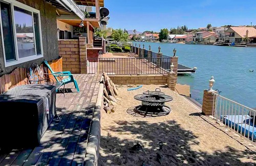 Victorville Casa | Dog-friendly waterfront home with private beach, firepit, dock, fireplace, grill