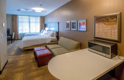 Downtown Denver Apartamento | Estudio totalmente equipado en el centro! Bañera de hidromasaje compartida, acceso a la piscina + desayuno gratuito