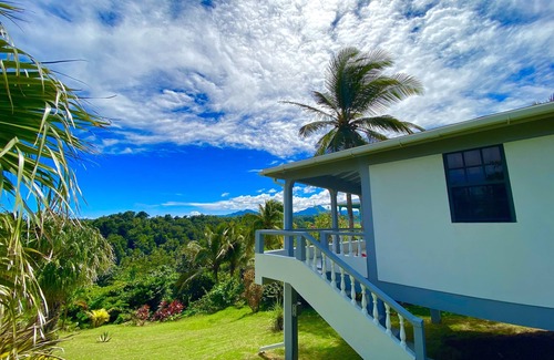 Calibishie Cabaña | Cabañas Sea Cliff # 1. Perfecto para dos personas y viene con una vista increíble.