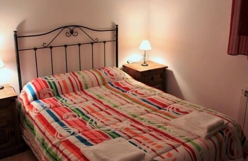 Una Apartamento | Casa el Escalerón 1 | Patio con vistas, chimenea y barbacoa