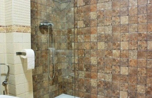 Una Apartamento | Casa el Escalerón 1 | Patio con vistas, chimenea y barbacoa