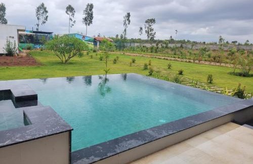 Doddaballapur Apartamento | Elysian Hideaway By StayJade3BHKPoolGardenLawn