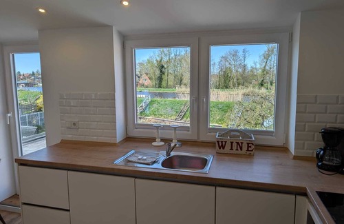 Wolthusen Apartamento | Emden - Holiday apartment with canal and field view