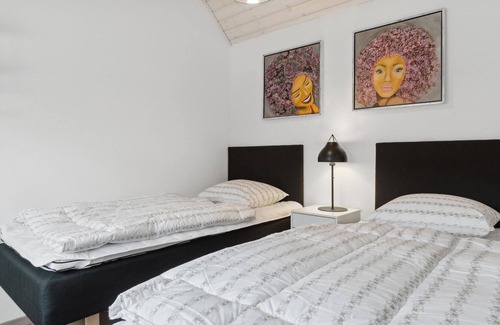 Nymindegab Casa | Enjoy a wonderful vacation near the fjord in this comfortable vacation home.