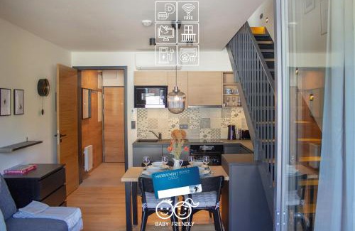 Harrachov Apartamento | ENJOYHARRACHOV - Atraktivní klidný klimatizovaný apartmán 20 v centru Harrachova s parkováním, Wifi-WLAN, SAT, herní konzolí, Ipad, Netflix zdarma, možností dobíjení auta, výhledem do zahrady a na kostelík jen 150m od lanovky