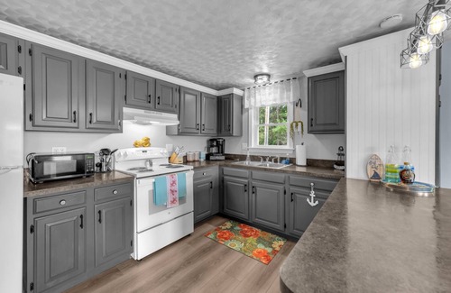 Belfast Casa | Experience the beauty of Belfast, Maine with a stunning ocean view!