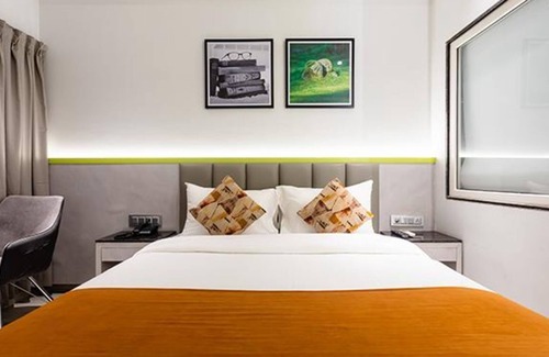 Bhopal Hotel | FabHotel Prime Oasis Orange