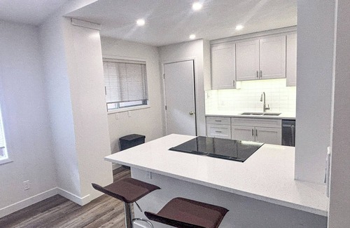 Northwest Calgary Casa | Fabulous 4-bedroom, two-bath home close to Downtown, the mountains and Banff