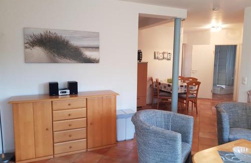 Neuensien Complejo | Ferienwohnung 4 im Haus am See mit Wintergarten und Terrasse