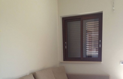 Marina di Montenero Apartamento | Apartamento en primera planta con 2 dormitorios con un gran jardín privado.