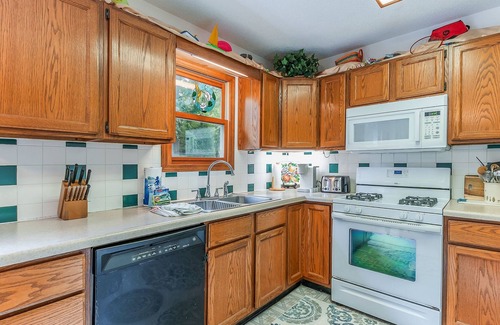 Ludington Cabaña | Four Seasons Cottage on Hamlin Lake Bayou