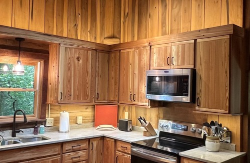 Saluda Cabina | Retiro de cuatro vientos en el río verde