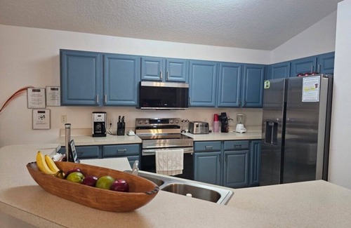 Legacy Park Villa | Gated 4 bed with Pool and Spa close to Disney