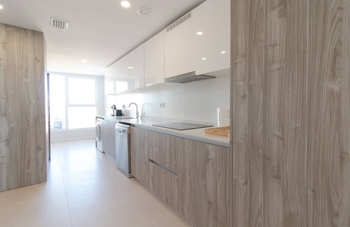 Canet de Berenguer Apartamento | Global Properties: Moderno apartamento de dos terrazas con vistas al mar y a la montaña.