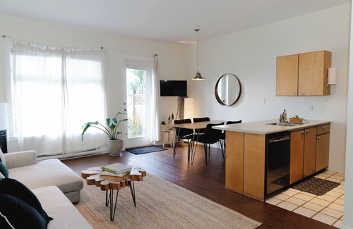 Tofino Condominio | Goodview Suite - licensed waterfront studio with a fireplace and patio