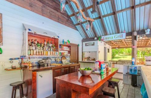 Sandy Bay Hotel | Guava Grove Resort & Villas