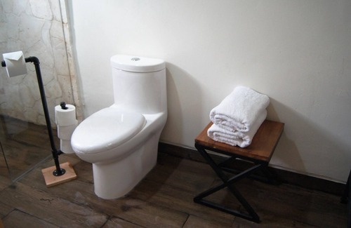 Barrio de Santiago Hotel | Habitación de lujo con king Size en el centro de Mérida.