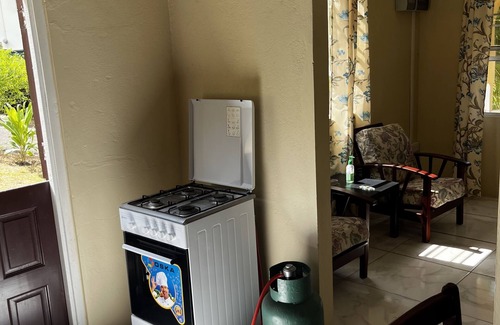 Calvigny Cabaña | Hibiscus Cottage Cheerful Home