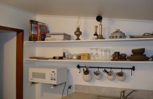 Clyde Condominio | Cabaña de piedra histórica