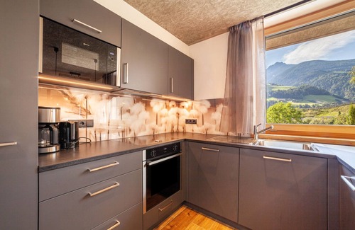 Saltusio Apartamento | Apartamento vacacional 'Chalet Riad 2' con vistas a la montaña y bañera de hidromasaje exterior