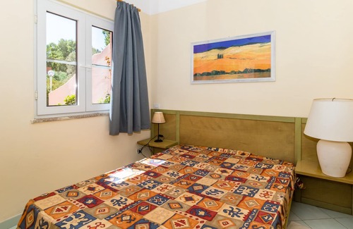 Canneddi Apartamento | Apartamento vacacional "Appartamentino vista mare 2414" con Terraza